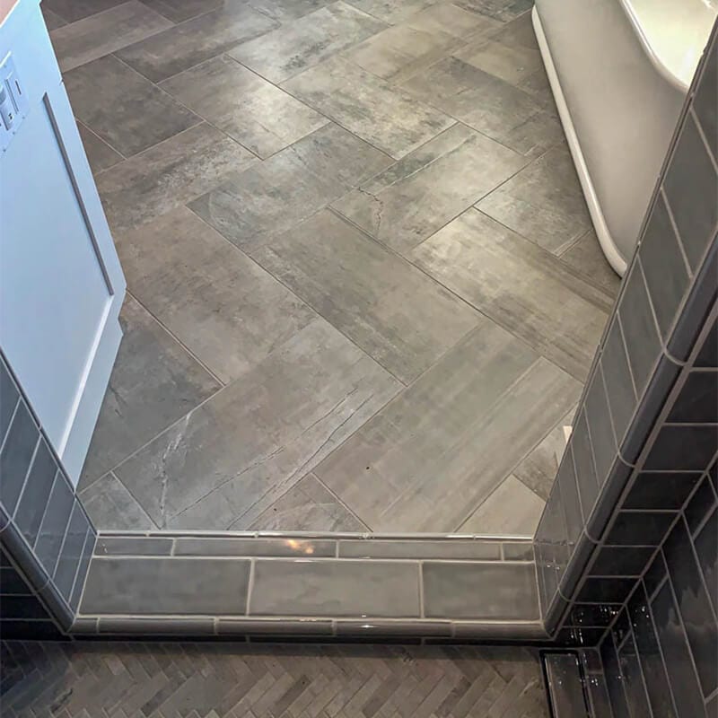 tile floor and shower stall